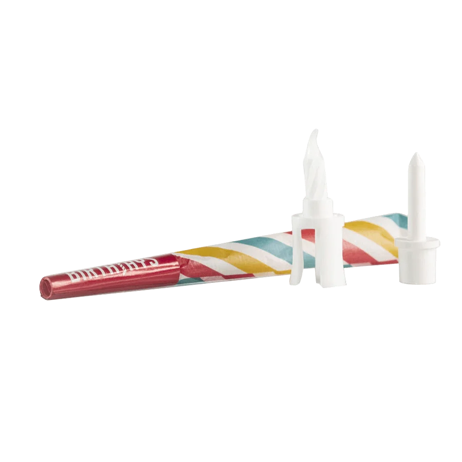 Birthjays cannabis pre-roll with striped birthday candles and white holders on white background