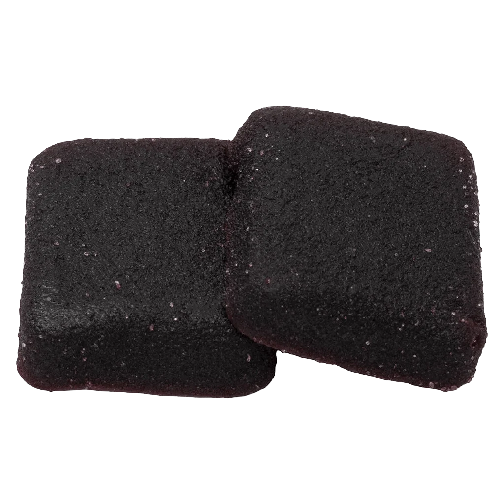 Gommes tendres Wyld CBD aux vraies baies de sureau, 750 mg de CBD et 150 mg de CBN, deux morceaux violet foncé avec des morceaux de fruits visibles