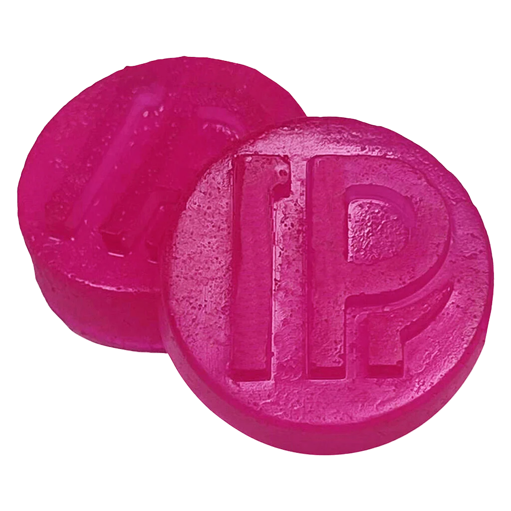 Pistol and Paris Pink Goo Live Rosin Gummies, two magenta soft chews with embossed branding